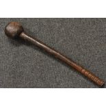 A 19th century knobkerry-type club, slightly grooving shaft,