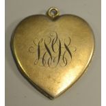 A late 19th century silver-gilt heart shaped locket pendant, marked Sterling, c.