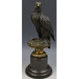 After Archibald Thorburn, a brown patinated sculpture, of an eagle, 31cm high,