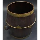 A Chinese brass mounted mahogany bowed cylindrical barrel, the sides with two handles,