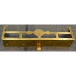 A 19th century brass fire fender, sinuous scroll end supports, 112cm wide, c.