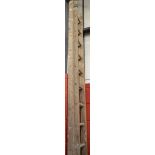 A vintage wooden two section extending ladder,