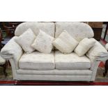 A two seat sofa, scroll arm,