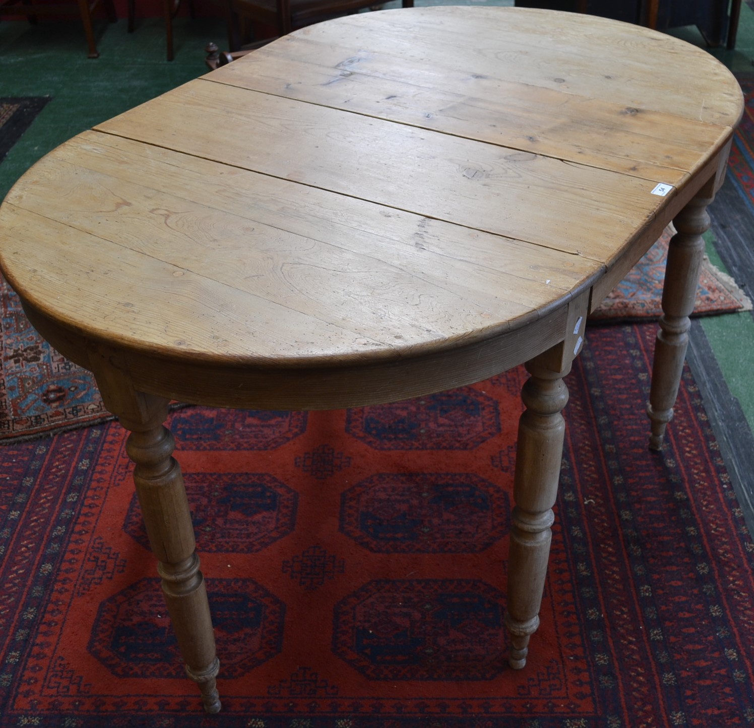 A 19th century pine dining table