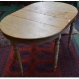 A 19th century pine dining table