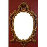 A Neo-Classical style oval giltwood mirror