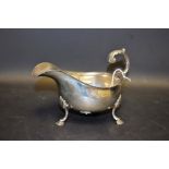 An Edwardian silver sauce boat, of George III design, shaped everted rim,