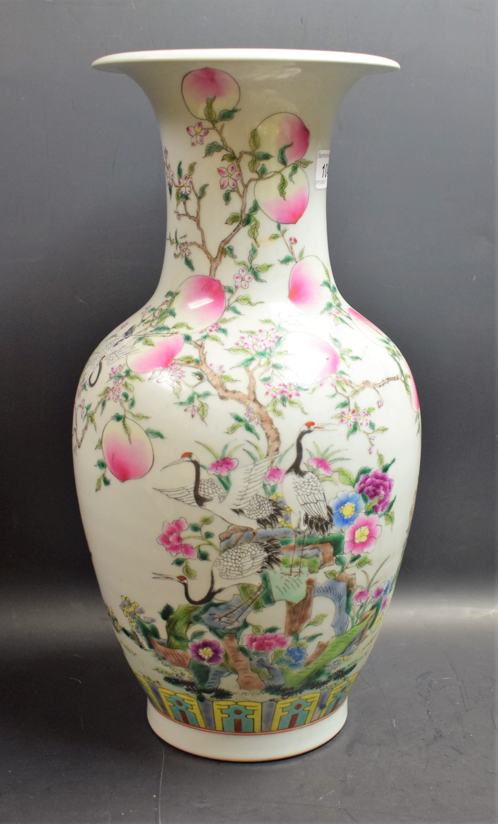 A Chinese ovoid vase, painted in polychrome enamels with cranes,