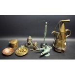 A verdigris bronze sculptural androgenous figure; a verdigris bronze Roman candle oil lamp;