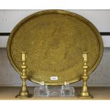 A large Persian style brass charger,