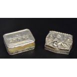 A 925 silver pill/trinket box, relief decorated with figures seated within tavern interior,