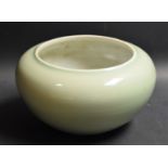 A Chinese celadon low circular brush washer,