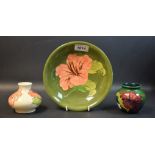 A Moorcroft Hibiscus pattern dish; a miniature compressed ovoid vase;