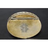 A 19th century silver coloured metal oval snuff box