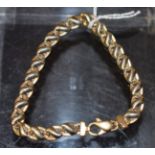 A 9ct gold smooth S-link bracelet, 15.