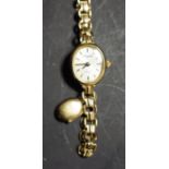 A 9ct gold Royale lady's wrist watch, oval dial, 9.