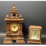 A German Cuckoo clock, architectural turreted case, open aperture, cream dial,