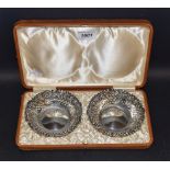 A pair of silver pierced sweetmeat baskets, 12cm diameter, Chester 1899,