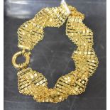 A Continental 9ct gold intertwined panel bracelet, Italian, 8.