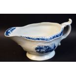 A large Worcester Fisherman and Billboard Island pattern strap fluted sauce boat,