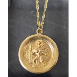 A 9ct gold circular St. Christopher pendant on chain, 27.