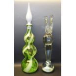 A Murano clear glass sculpture, two entwined figures; a 1960's spiral glass bottle vase,