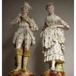 A pair of early 19th century French bisque figures, Horn Player and Companion,