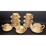 A Japanese Satsuma tea service, for six, comprising teacup, saucers, teapot, milk jug, sugar bowl,