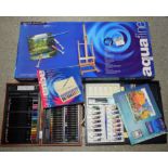 Artist's Materials - an easel, colours, paint boxes,