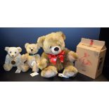 A Steiff Millennium bear, boxed, certificate; a Steiff Button in Ear bear, dust bag,