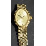 A 9ct gold lady's Vicence wrist watch, oval dial, 16.