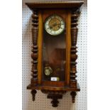 A 19th century Junghans mahogany Vienna wall clock enamelled chapter ring, Roman numerals,