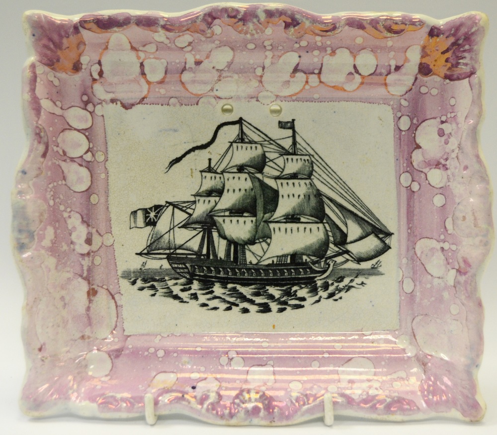 A 19th century Sunderland lustre rectangular plaque, transfer printed with a ship, pink border, 21.