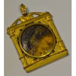 A 19th Derbyshire Blue John mounted gilt metal pendant, architectural setting, c.