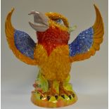 A Peggy Davis Ceramics model, The Phoenix, in yellow, red and blue, 20.