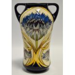 A contemporary Moorcroft Cornflower pattern two handled waisted vase,