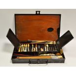 A Windsor and Newton artists box, containing brushes,