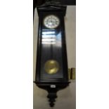 A 19th century ebonized Vienna wall clock, porcelain dial, subsidiary secondary dial,