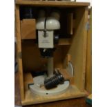 A P70 Warszawa binocular microscope,