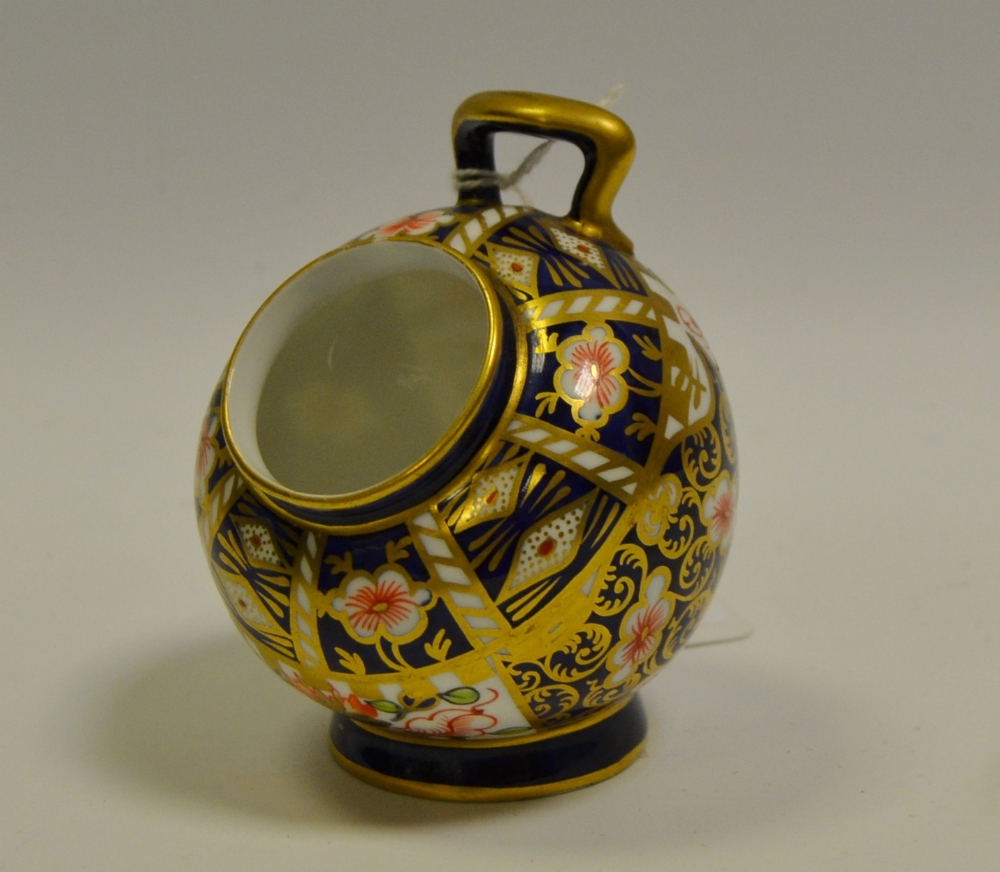 A Royal Crown Derby miniature scuttle, 9cm high, printed mark,