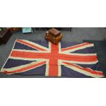 A leather suitcase, two others; a large 20th century Union Jack.