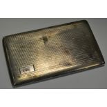 A large engine turned silver rectangular cigarette case, Joseph Paul, Chester 1944, 214.