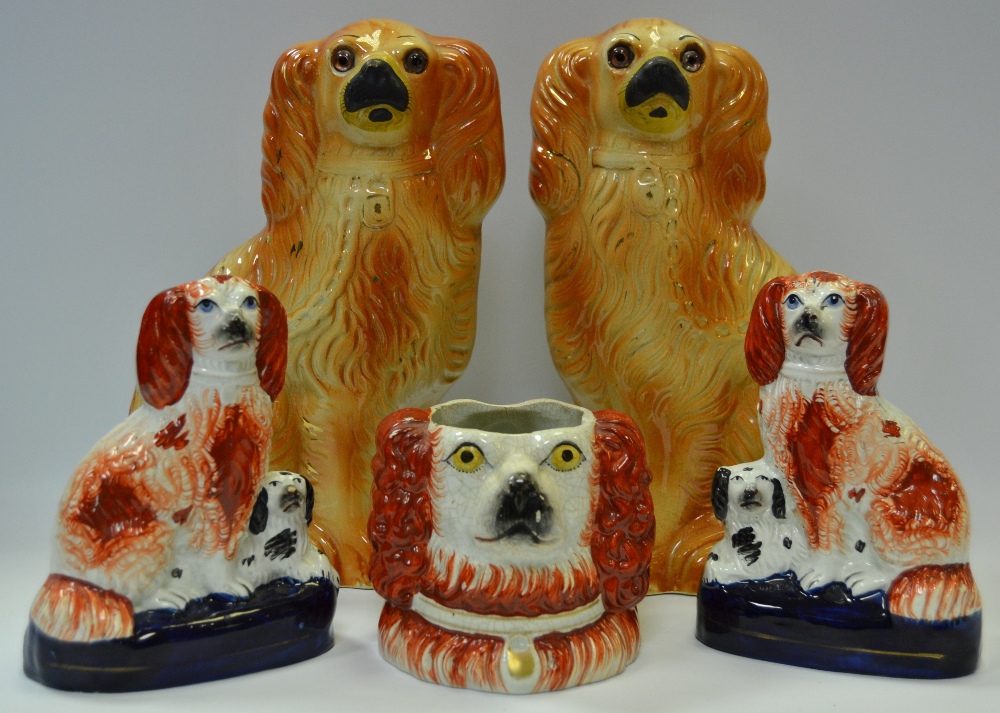 A pair of 19th century Staffordshire spaniel mantel dogs,