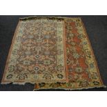 A pair of hand knotted Pakistan rugs, terracotta ground.