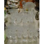 A cut glass ships decanter, a set of 6 whisky tumblers, 6 brandy glasses, 6 wine glasses,