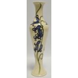 A contemporary Moorcroft slender ovoid vase, tube lined with blue harebells on a cream ground, 31.