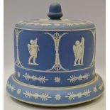 A Wedgwood style jasperware cheese dome with acorn finial, applied putti and foliate decoration,