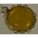 A Queen Elizabeth II gold sovereign, 1965, mounted, 9.