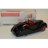 A Schuco Examico 4031 model clockwork car,