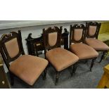 Four Victorian mahogany dining chairs, shaped and carved top rail , padded rail and seat,